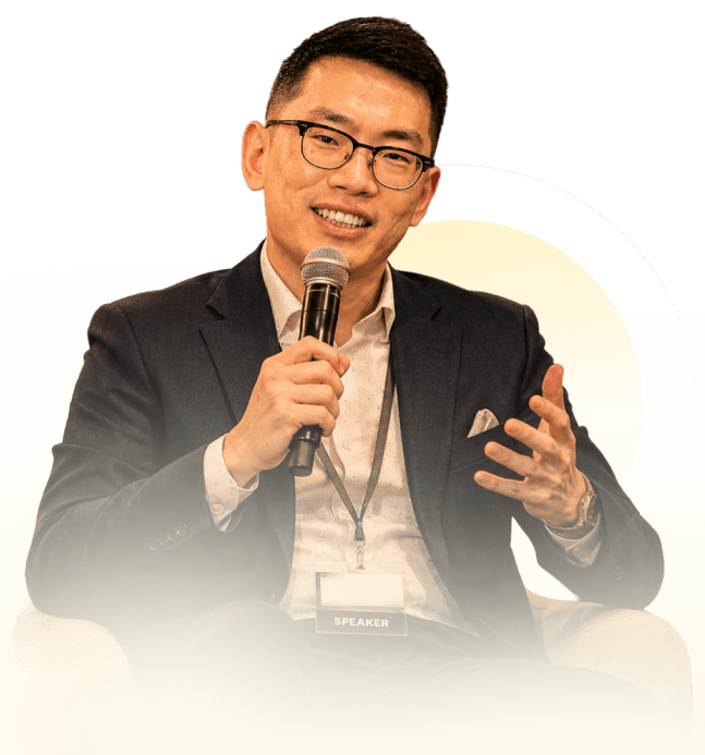 Photo of Robert Tan at a speaking event